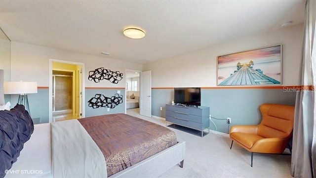 8900 Sydney Ave, Kissimmee, FL 34747 - carpeted bedroom featuring baseboards and connected bathroom