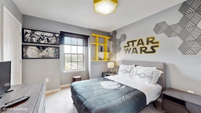 8900 Sydney Ave, Kissimmee, FL 34747 - carpeted bedroom featuring baseboards