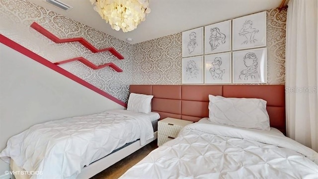 8900 Sydney Ave, Kissimmee, FL 34747 - bedroom featuring wallpapered walls and a chandelier