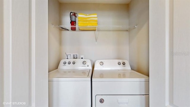 8900 Sydney Ave, Kissimmee, FL 34747 - laundry room featuring washer and dryer