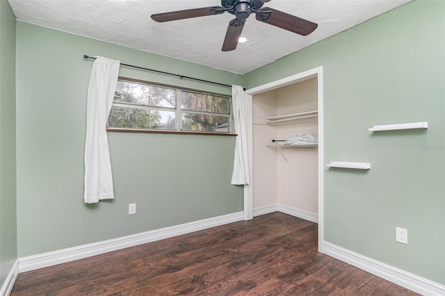 13 Scott Ln, Rockledge, FL 32955 - unfurnished bedroom with wood finished floors, a closet, baseboards, and a ceiling fan