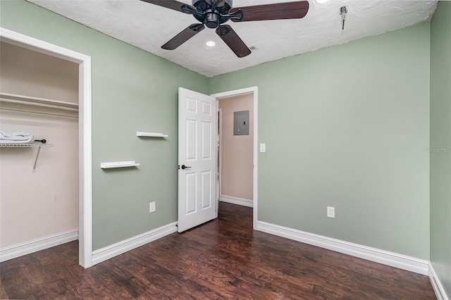 13 Scott Ln, Rockledge, FL 32955 - unfurnished bedroom featuring electric panel, wood finished floors, baseboards, a closet, and ceiling fan