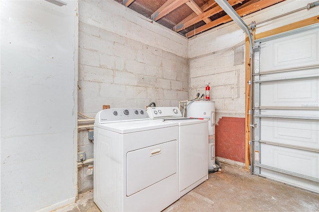 13 Scott Ln, Rockledge, FL 32955 - laundry area with washer and clothes dryer, concrete block wall, and electric water heater