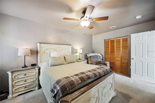 1649 W Waycross Cir, Deltona, FL 32725 - bedroom with light colored carpet, a closet, and a ceiling fan