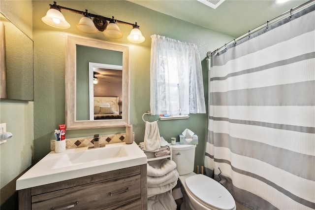 1649 W Waycross Cir, Deltona, FL 32725 - full bathroom with vanity, toilet, a textured wall, and a shower with shower curtain