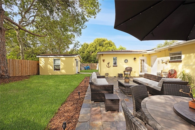 1649 W Waycross Cir, Deltona, FL 32725 - view of patio / terrace with outdoor lounge area and an outbuilding