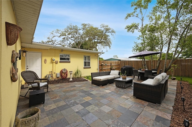 1649 W Waycross Cir, Deltona, FL 32725 - fenced backyard with outdoor lounge area and a patio