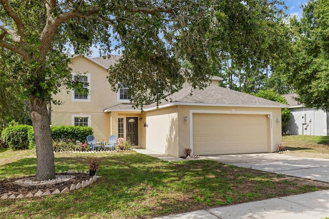 2255 Tealwood Cir, Tavares, FL 32778 - view of front facade featuring stucco siding, an attached garage, driveway, roof with shingles, and a front lawn