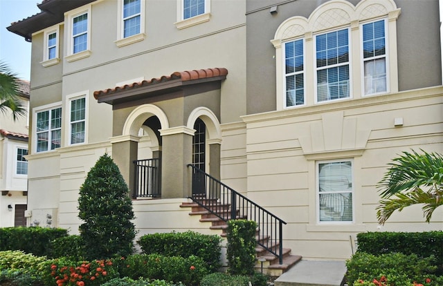 312 Trieste Loop, Lake Mary, FL 32746 - view of front of house featuring stairs and stucco siding
