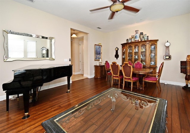 312 Trieste Loop, Lake Mary, FL 32746 - dining area with a ceiling fan, wood-type flooring, and baseboards