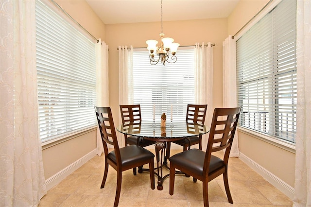 312 Trieste Loop, Lake Mary, FL 32746 - dining room featuring a chandelier and baseboards