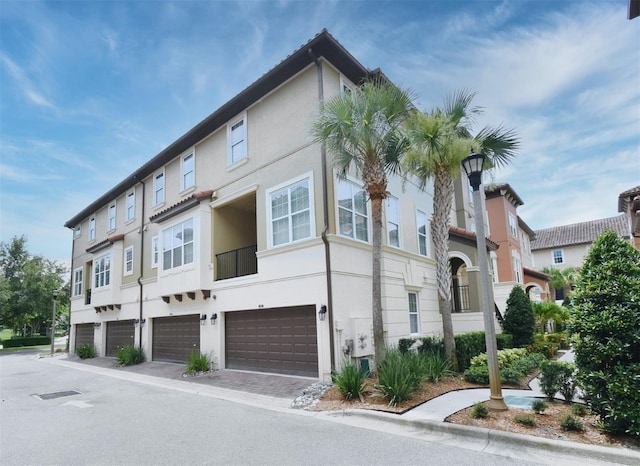 312 Trieste Loop, Lake Mary, FL 32746 - view of property featuring a garage