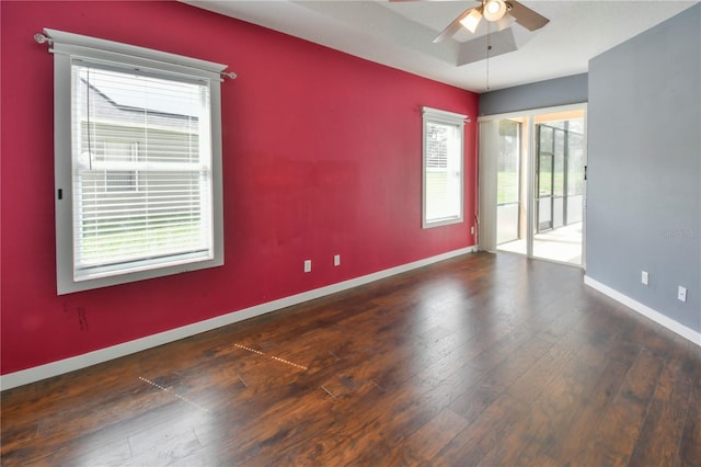 831 Corvina Dr, Davenport, FL 33897 - spare room featuring a ceiling fan and hardwood / wood-style floors
