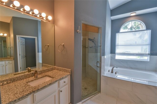 831 Corvina Dr, Davenport, FL 33897 - bathroom featuring a bath, vanity, and a shower stall