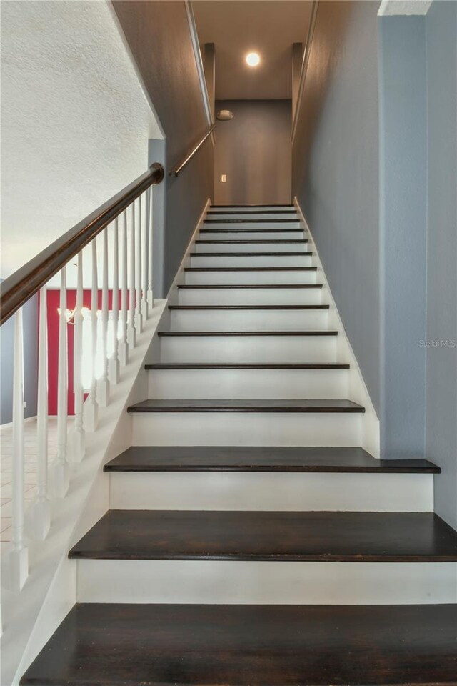 831 Corvina Dr, Davenport, FL 33897 - stairs with recessed lighting
