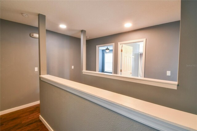 831 Corvina Dr, Davenport, FL 33897 - hallway with dark wood-style flooring and recessed lighting