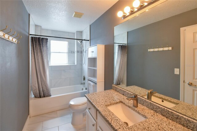 831 Corvina Dr, Davenport, FL 33897 - bathroom with vanity, shower / bath combo with shower curtain, a textured ceiling, and tile patterned floors