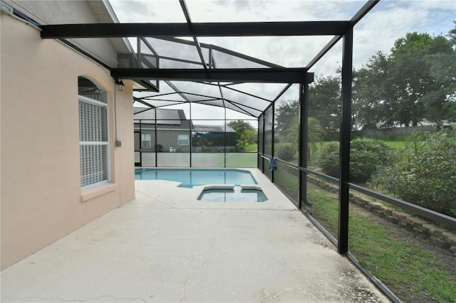 831 Corvina Dr, Davenport, FL 33897 - view of swimming pool with a patio area, a lanai, and a pool with connected hot tub