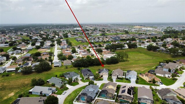 831 Corvina Dr, Davenport, FL 33897 - aerial view of property's location featuring nearby suburban area