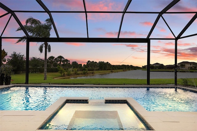 3222 Casterton Dr, Melbourne, FL 32940 - pool at dusk with a water view, glass enclosure, a pool with connected hot tub, and a lawn