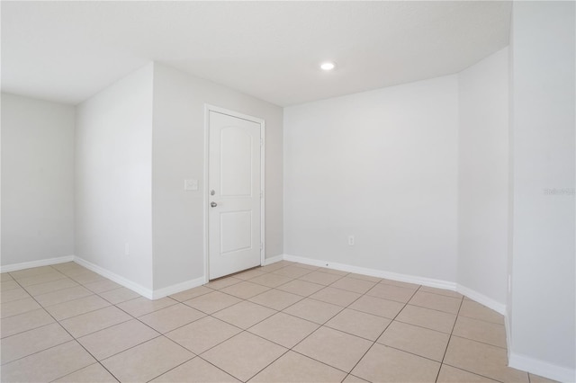 257 Fig Ct, Kissimmee, FL 34759 - spare room featuring recessed lighting and light tile patterned floors