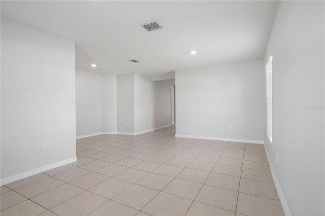 257 Fig Ct, Kissimmee, FL 34759 - empty room featuring recessed lighting and light tile patterned floors