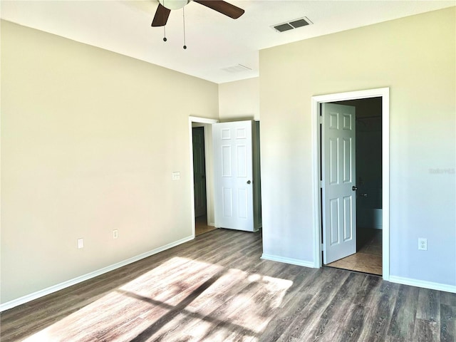 535 Aeolian Dr, New Smyrna Beach, FL 32168 - unfurnished bedroom with wood finished floors and a ceiling fan