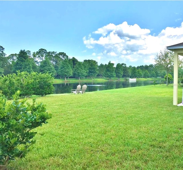 535 Aeolian Dr, New Smyrna Beach, FL 32168 - view of grassy yard with a water view