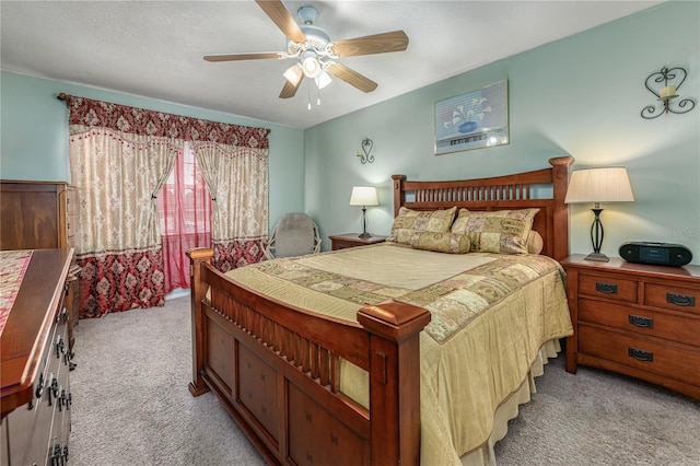 1000 S Semoran Blvd Unit 604, Winter Park, FL 32792 - bedroom featuring light carpet and a ceiling fan