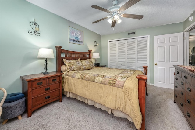 1000 S Semoran Blvd Unit 604, Winter Park, FL 32792 - bedroom with light colored carpet, a closet, and a ceiling fan