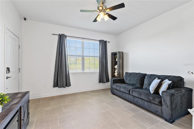 3123 Camden Way, Davenport, FL 33837 - living area with ceiling fan, baseboards, and light tile patterned floors