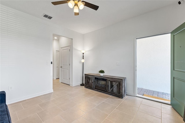 3123 Camden Way, Davenport, FL 33837 - unfurnished room with ceiling fan, baseboards, and light tile patterned floors