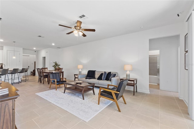 3123 Camden Way, Davenport, FL 33837 - living area with ceiling fan, light tile patterned floors, recessed lighting, and baseboards