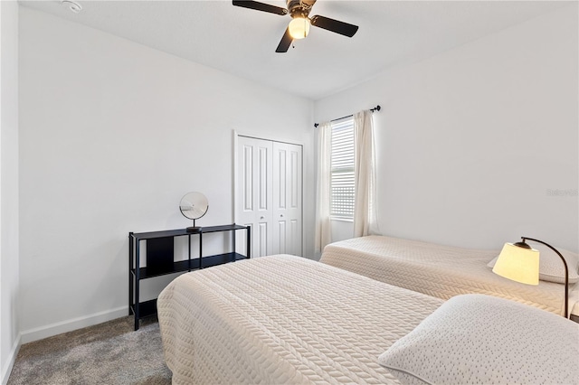 3123 Camden Way, Davenport, FL 33837 - carpeted bedroom with a closet, baseboards, and a ceiling fan