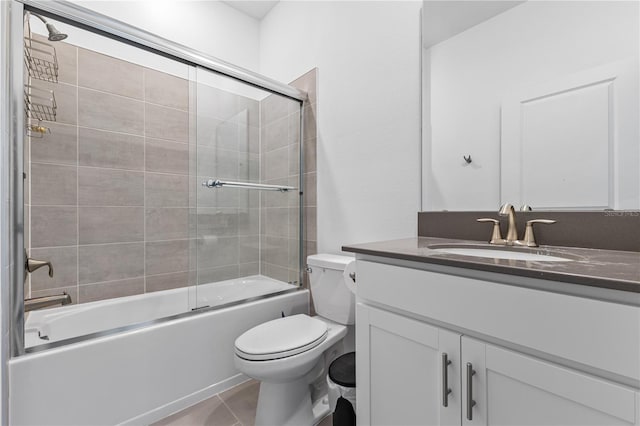 3123 Camden Way, Davenport, FL 33837 - bathroom featuring vanity, toilet, enclosed tub / shower combo, and tile patterned floors
