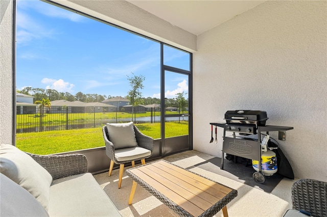 3123 Camden Way, Davenport, FL 33837 - sunroom / solarium featuring a water view, an outdoor hangout area, and a residential view