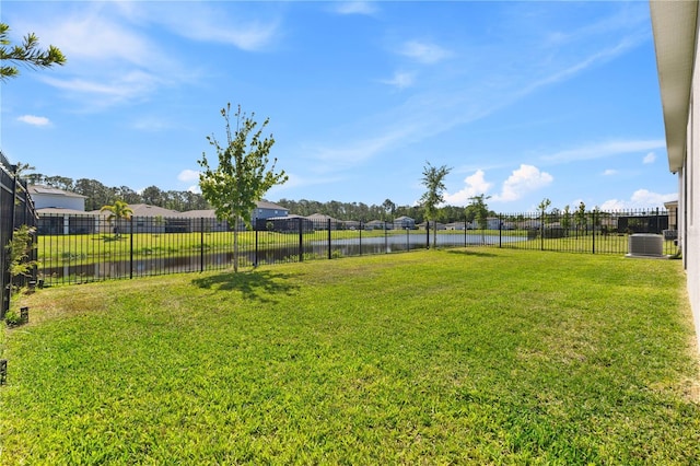 3123 Camden Way, Davenport, FL 33837 - view of yard with a water view and central AC unit