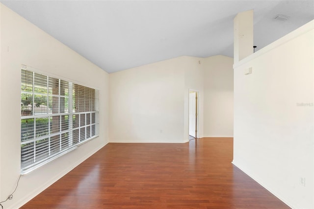 40 Hollow Pine Dr, Debary, FL 32713 - unfurnished room with lofted ceiling and wood finished floors