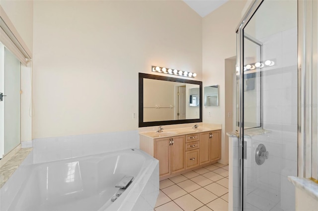 40 Hollow Pine Dr, Debary, FL 32713 - bathroom with a stall shower, a garden tub, double vanity, and tile patterned floors