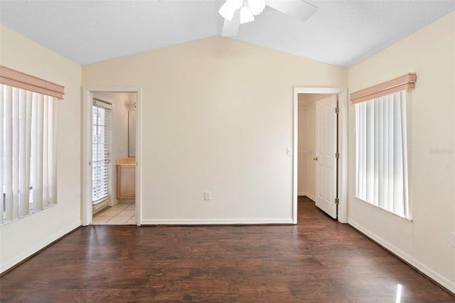40 Hollow Pine Dr, Debary, FL 32713 - unfurnished bedroom featuring lofted ceiling, wood finished floors, ensuite bathroom, and a ceiling fan