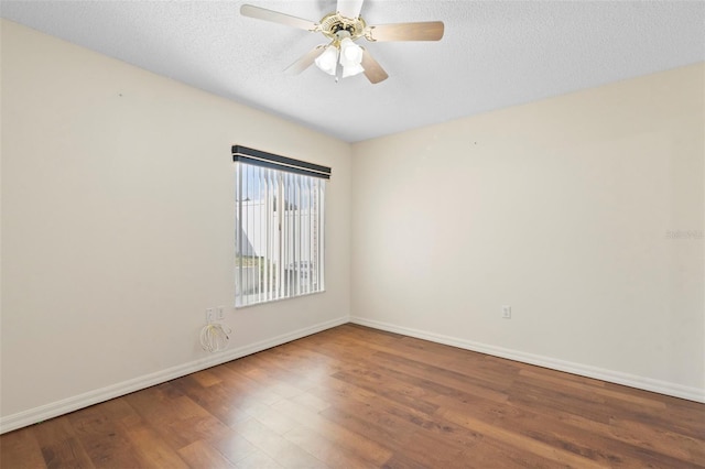 40 Hollow Pine Dr, Debary, FL 32713 - unfurnished room with wood finished floors, ceiling fan, and a textured ceiling