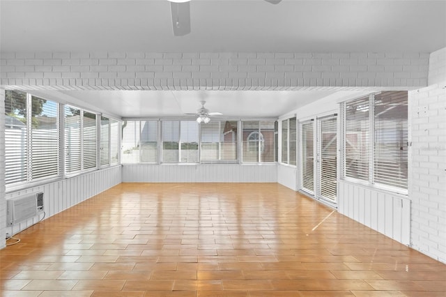 40 Hollow Pine Dr, Debary, FL 32713 - unfurnished sunroom featuring a ceiling fan, wood finished floors, and a wall mounted AC