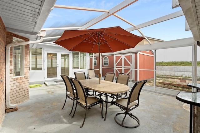40 Hollow Pine Dr, Debary, FL 32713 - view of patio featuring outdoor dining space, french doors, a shed, and glass enclosure