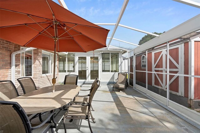 40 Hollow Pine Dr, Debary, FL 32713 - view of patio with french doors, a shed, and outdoor dining area
