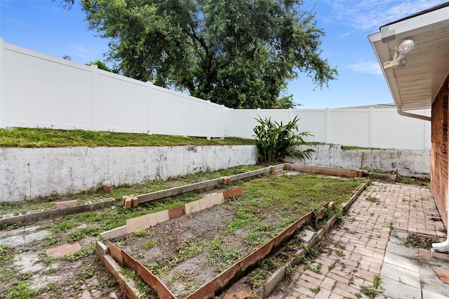 40 Hollow Pine Dr, Debary, FL 32713 - fenced backyard featuring a garden