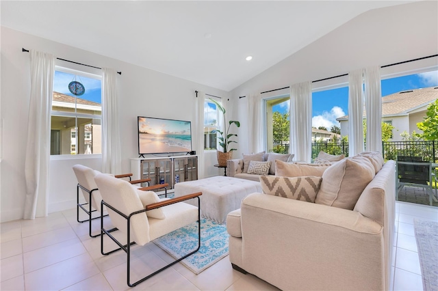744 Curly Locks Loop, Apopka, FL 32703 - living area with lofted ceiling, healthy amount of natural light, light tile patterned flooring, and recessed lighting