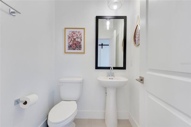 744 Curly Locks Loop, Apopka, FL 32703 - bathroom featuring toilet and tile patterned floors