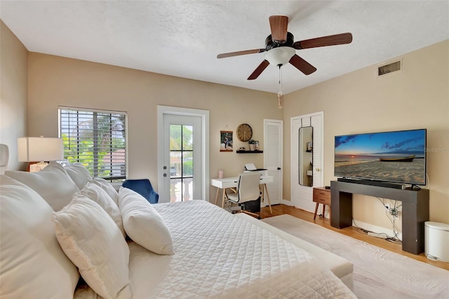 322 Cornell Dr, Lake Worth, FL 33460 - bedroom with wood finished floors and ceiling fan