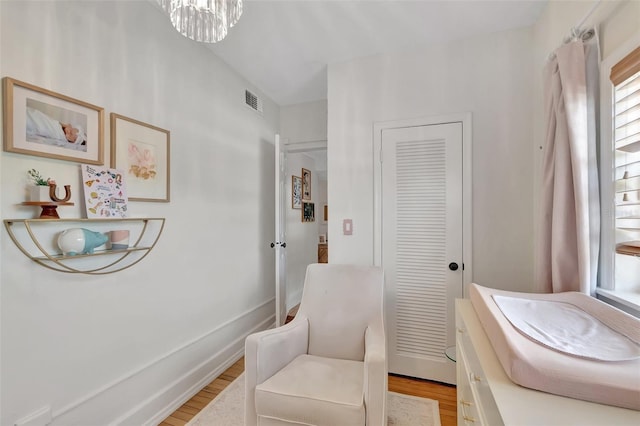 322 Cornell Dr, Lake Worth, FL 33460 - bathroom with wood finished floors, a chandelier, and vanity