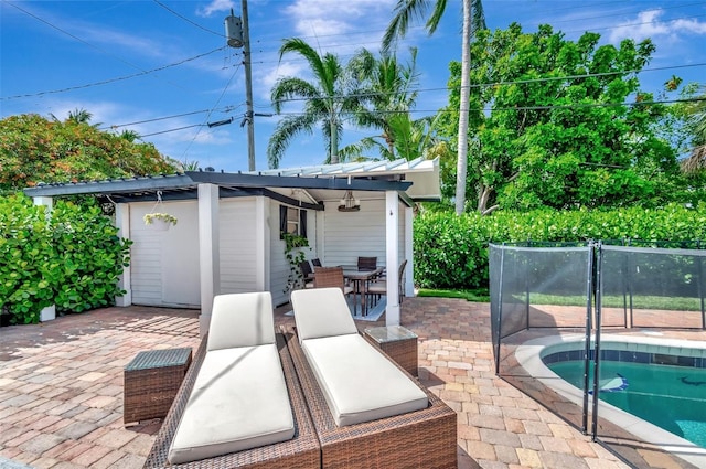 322 Cornell Dr, Lake Worth, FL 33460 - view of patio / terrace featuring outdoor dining space and a jacuzzi